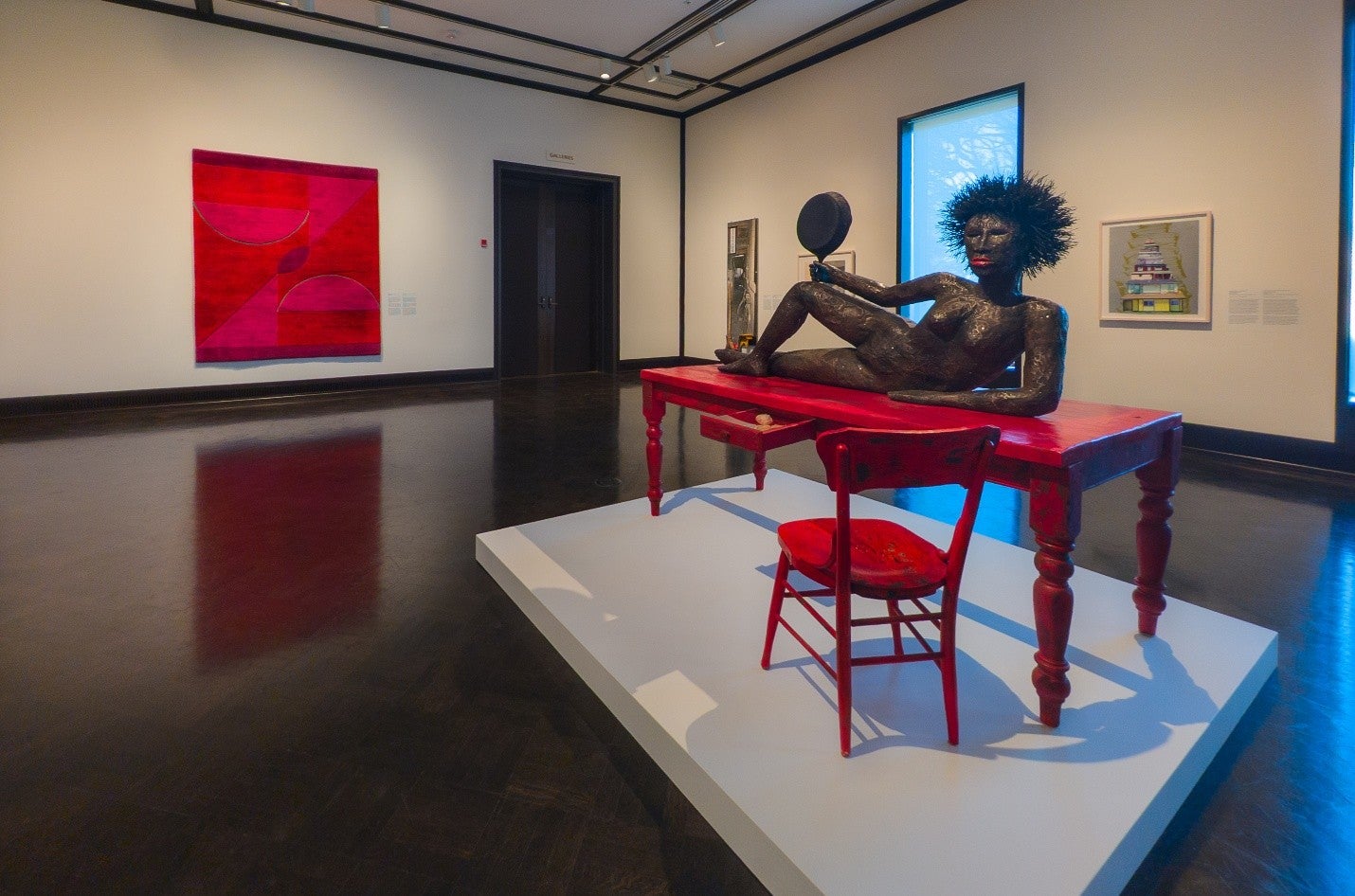 Installation image of Alison Saar sculpture in Love, Desire, and Sorrow